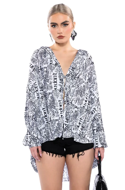 THAT NEW NEWS PRINTED PLEATED TIE FRONT BLOUSE Stretchy Fitted Blouse